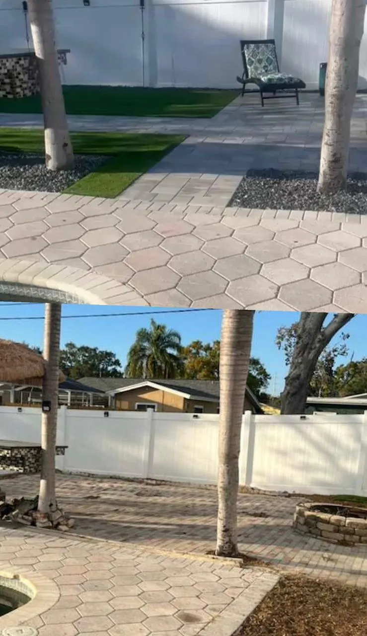 Hexagonal paver patio with artificial turf beside a pool
